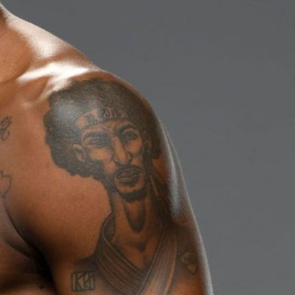   Татуировка с портрет на Кевин Холанд на рамото